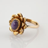 Verspielter Blütenring aus Gold mit Amethyst