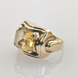 Eleganter goldener Ring mit rechteckigem gelbem Edelstein in poliertem Design