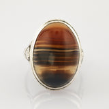 Silberring mit ovalem Edelstein, braun-schwarzen und beigen Streifen