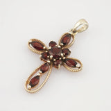 Kreuzanhänger aus Silber mit Granaten