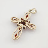 Kreuzanhänger aus Silber mit Granaten