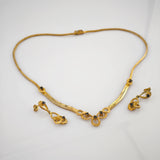 Vergoldetes Schmuckset mit blauen Zirkonia-Steinen