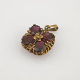 Blüten-Anhänger aus Gold mit Granaten