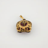 Blüten-Anhänger aus Gold mit Granaten