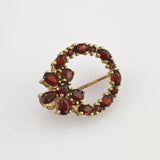 Florale Granat-Brosche aus Gold