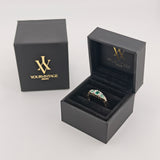 Eleganter Goldring mit Smaragden und Diamanten