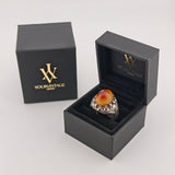 Orientalischer Silberring mit orangebraunem Cabochonstein