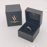 Weißgoldring mit Smaragd und Brillanten