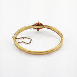 Vergoldeter Armreif mit Granatbesatz