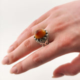 Orientalischer Silberring mit orangebraunem Cabochonstein