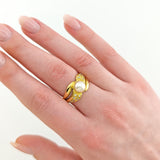 Eleganter Goldring mit Perle und Glaselementen