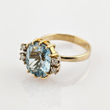 Eleganter Goldring mit Blauen Topas und Diamanten