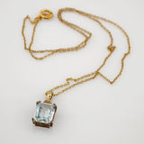 Feine Goldkette mit Aquamarin-Anhänger