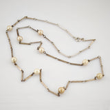 Lange Silberkette mit Perlen