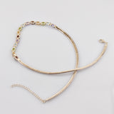 Silberkette mit farbigen Edelsteinen – im Stil der 1990er