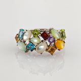 Silberring mit bunt gefassten Edelsteinen – im Stil der 1990er