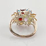 Silberring mit farbigen Edelsteinen in Blütenform