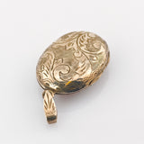 Medaillon Silber graviert mit Pflanzenornamenten, um 1900