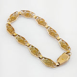 Goldarmband mit floralen Gliedern, um 1950