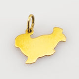 Glänzender goldener Dackelanhänger mit glatter Oberfläche und Schlaufe