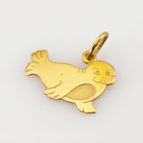 Goldanhänger in Form einer stilisierten Robbe