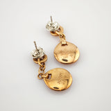 Goldfarbene Ohrhänger mit runden JOOP! und 925 Gravuren auf weißem Hintergrund