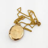 Historisches Medaillon vergoldet mit Emaille-Floralmotiv