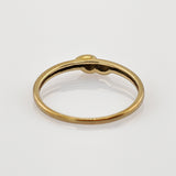 Feiner Goldring mit zentralem Rubin