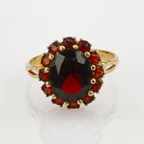 Vintage-Goldring mit Granatblüte