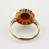 Vintage-Goldring mit Granatblüte