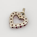 Herzförmiger Weißgold Anhänger mit roten Spinellen