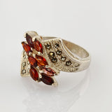Jugendstil-Silberring mit Granaten in Navette-Schliff um 1920