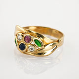Goldring mit Spinellen und grünen Glassteinen