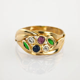 Goldring mit Spinellen und grünen Glassteinen