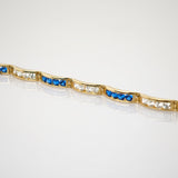 Goldarmband mit blauem Spinell und Quarz im Art-Déco-Stil