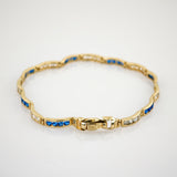 Goldarmband mit blauem Spinell und Quarz im Art-Déco-Stil