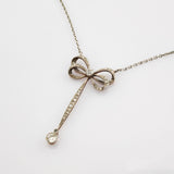 Kette Gold Platin Schleifenmotiv mit Diamanten im Stil Art-déco