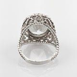 Silberner Ring mit verdrehten Seilmustern und großem klarem facettiertem Stein in Kronenfassung
