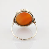 Silberring mit ovalem orangefarbenem Stein in verzierter Fassung, Vintage-Schmuck