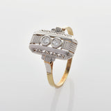 Vintage-Ring mit feiner Goldfassung 375 und verziertem Silber mit geometrischen Mustern und zwei klaren, runden Steinen.